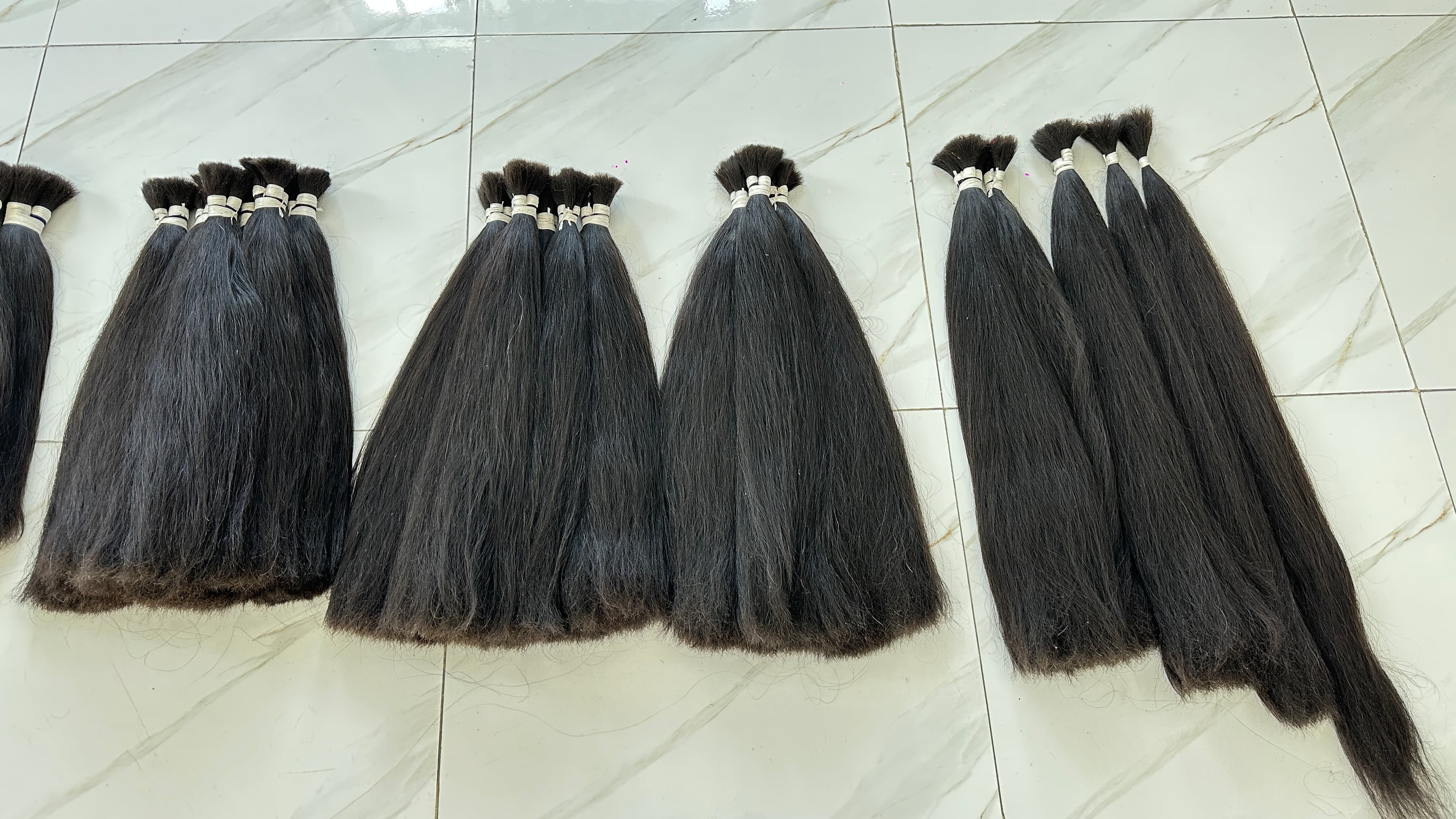Premium Bulk Hair Sourcing & Distribution